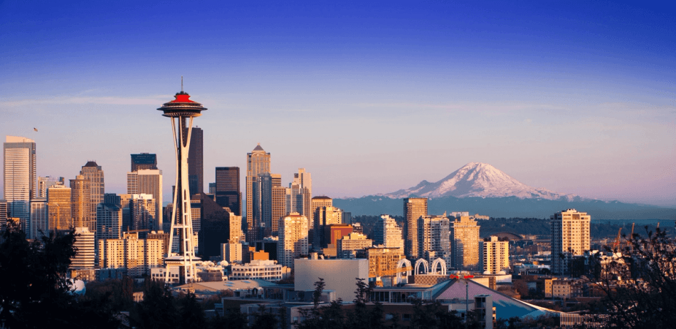City skyline of Seattle, WA with Mount Rainier in background